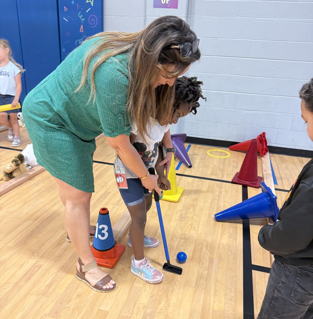 Dove Elementary students working on TEKS "striking unit" with a mini golf course
