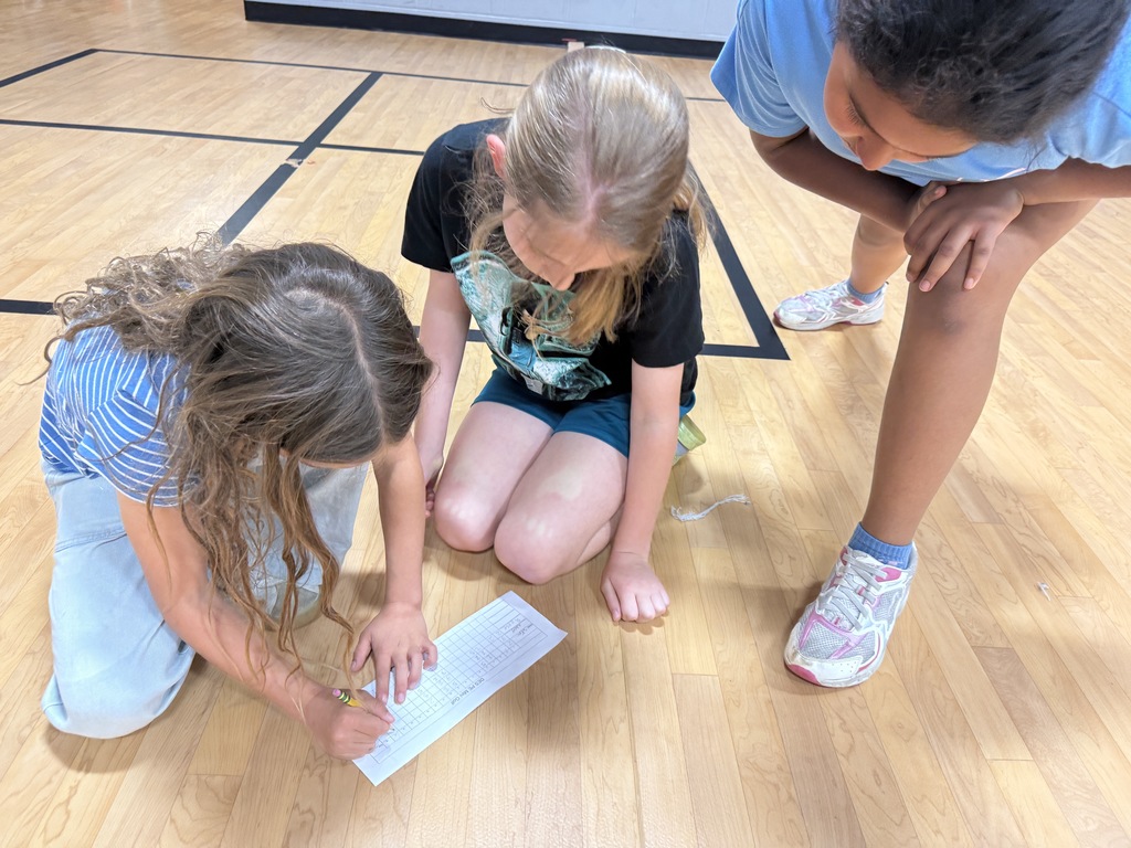 Dove Elementary students working on TEKS "striking unit" with a mini golf course