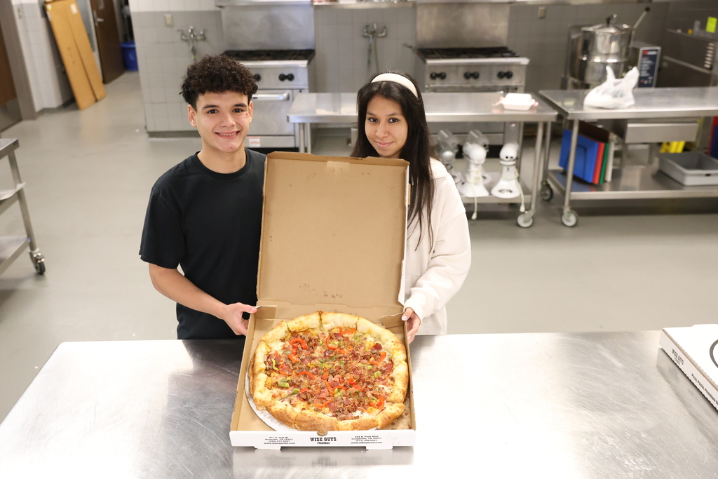 Students with pizza