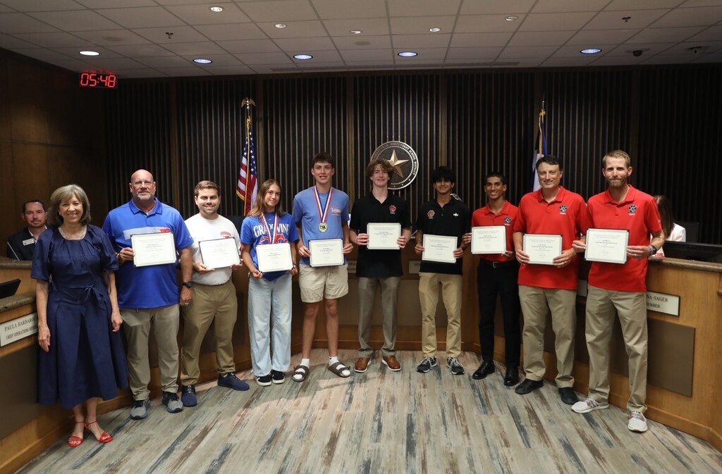 Board meeting student and staff honorees