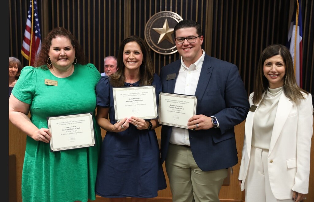 Board meeting student and staff honorees