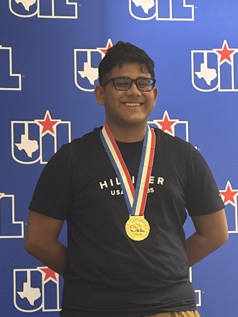 Piyush Mallick standing on a podium for winning a State Championship for UIL Mathematics