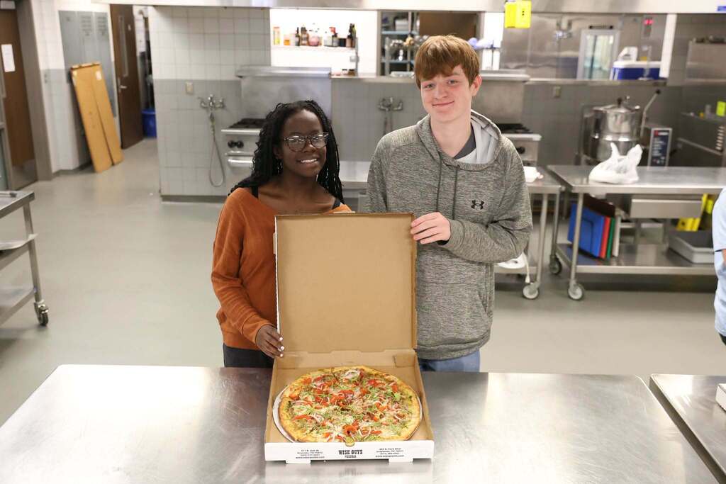 Winning pizza and two students