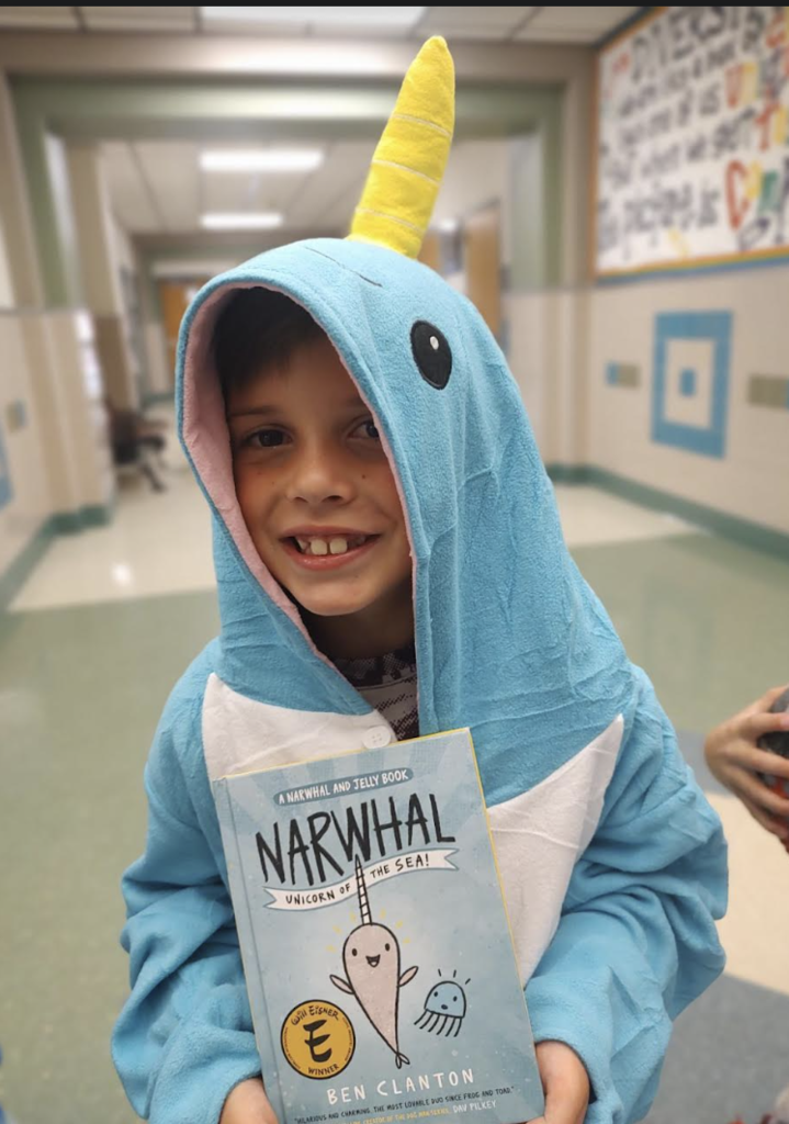 Students dressed a narwal for dress like a book character day.