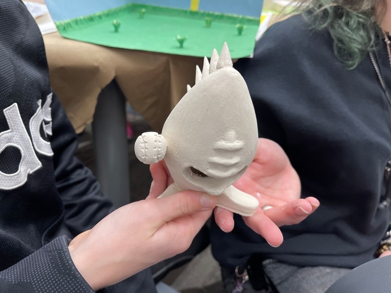 Showing clay sculpture