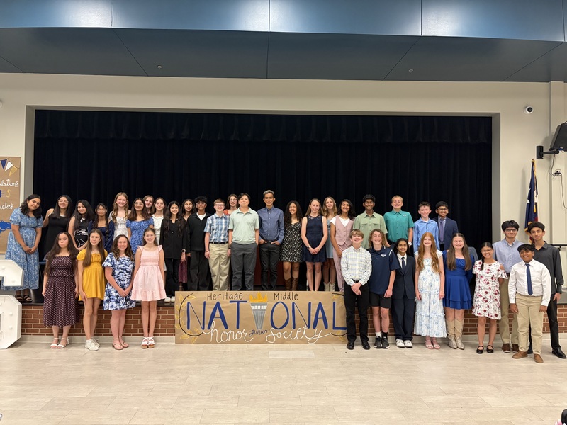 7th grade posing for an NJHS ceremony in the cafeteria