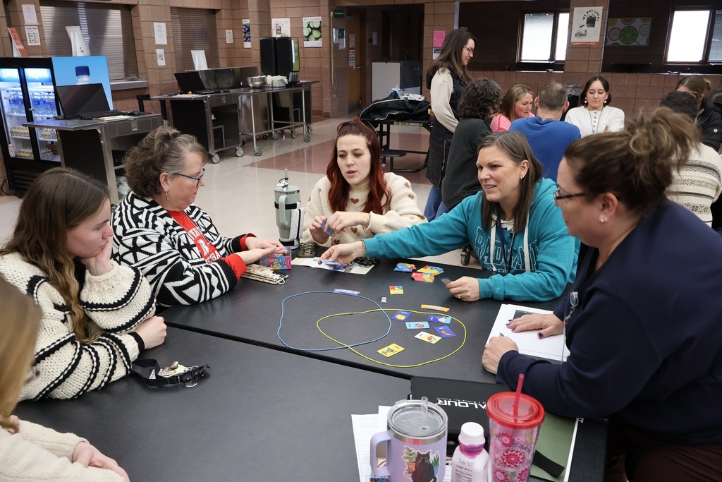 Teachers play a game.