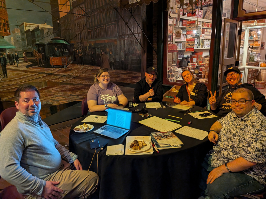 Educators play Dungeons and Dragons at the MACUL after-hours reception.