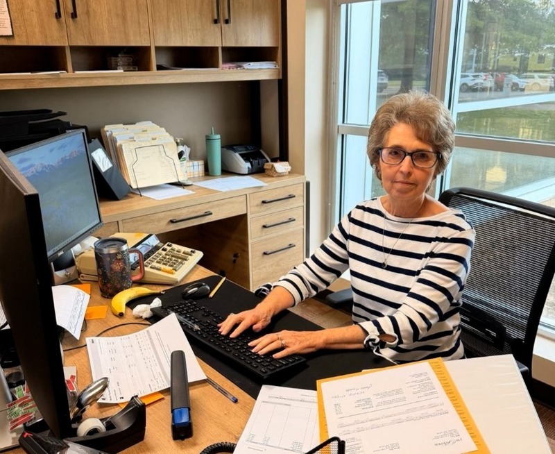 Kay Russow at her desk