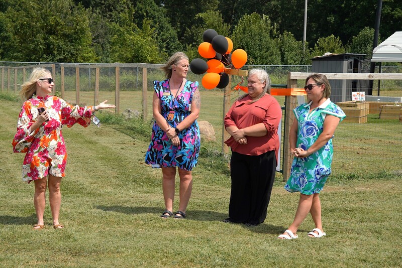 Dr. Newsom introducing April Jones, Crystal Daubenmire, and Kirsten May at the Grand Opening Ceremony for the Outdoor Classroom