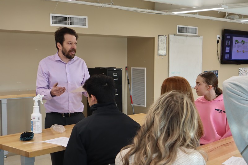 Mr Leach leading students in an experiment