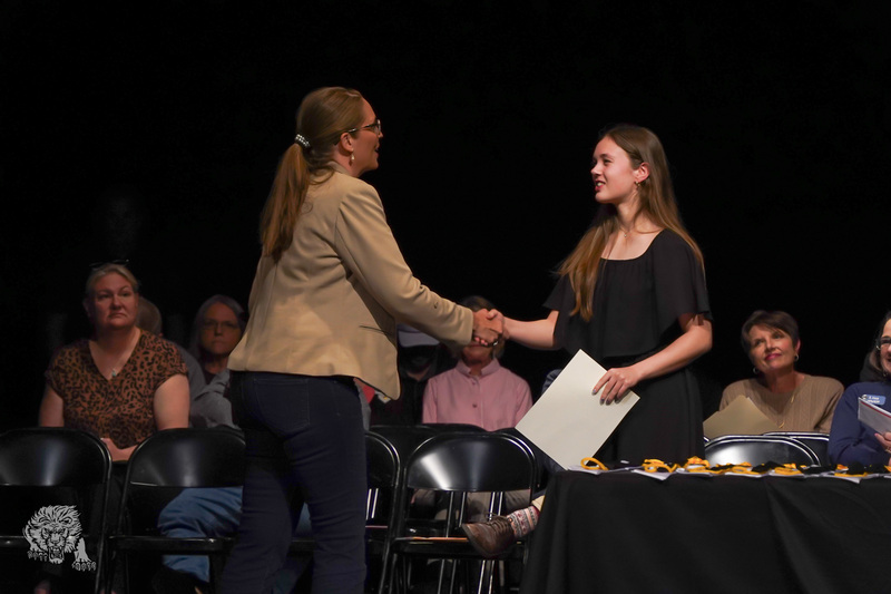 A University of Central Arkansas representative recognized Parker Pittman for receiving the Schedler Honors College Scholarship, valued at $42,000.