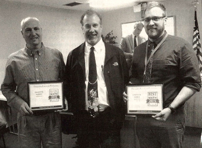 Randall Reynolds, Former Principal Duane Thomas, and Taylor Lewis, recognized at the December 2015 School Board meeting for high test scores. Photo by Susan Holland
