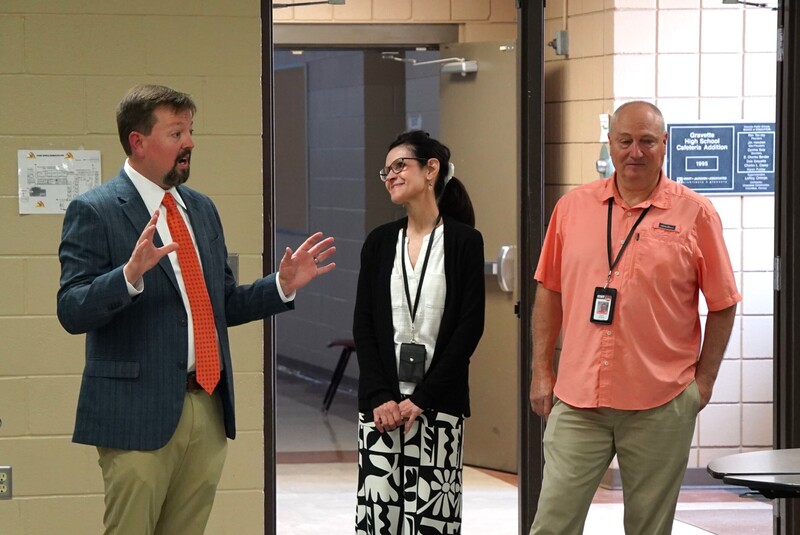 Superintendent Jeff Gravette spoke at the celebration, joining colleagues and friends in recognizing two careers that had become part of the middle school’s identity.