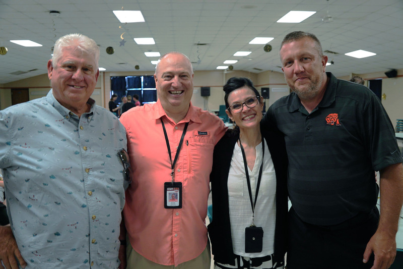 Former Principal Mitchell Wilber, Randall Reynolds, Shirley Reynolds, and Principal Taos Jones