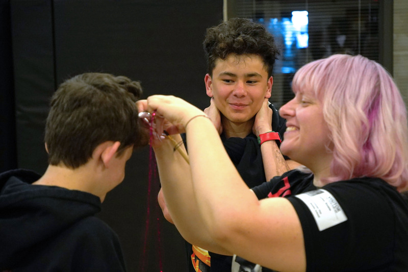 Students explored cosmetology careers with hair artist Taylor Evans, learning about styling techniques, creativity, and the business side of the beauty industry.