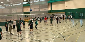 students playing 9 square in PE