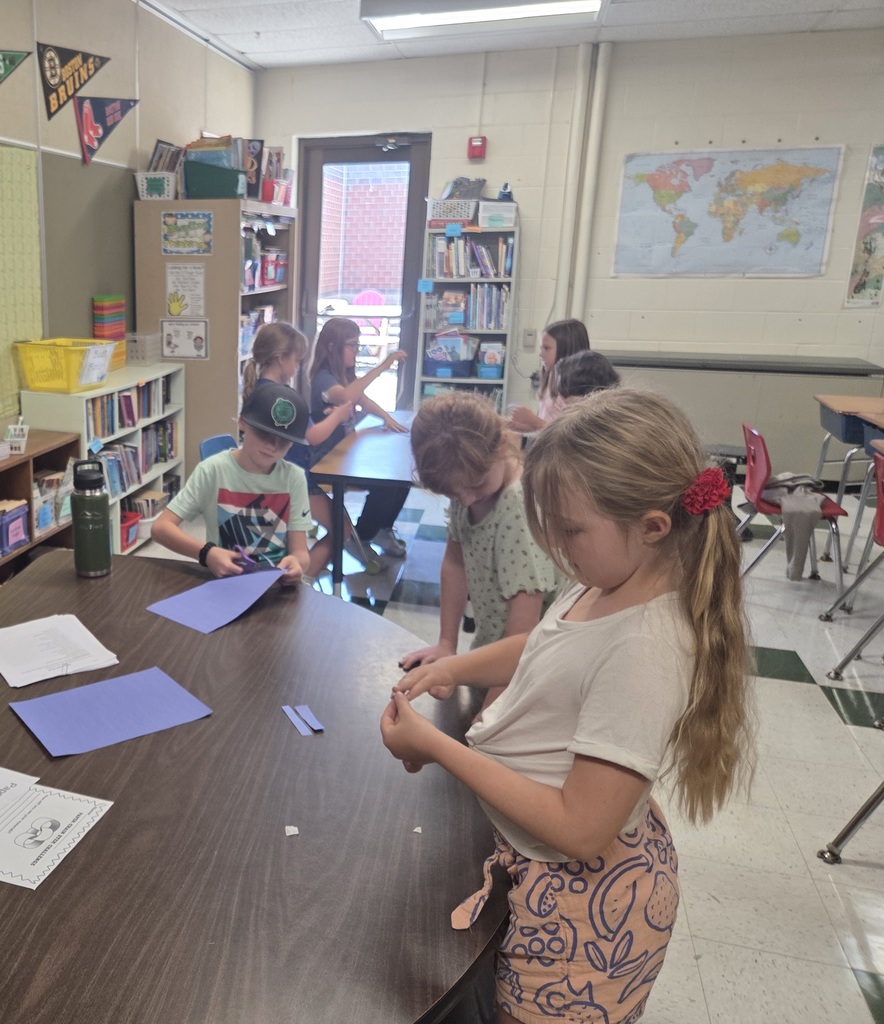 3rd grade builds the longest paper chain in 15 minutes!