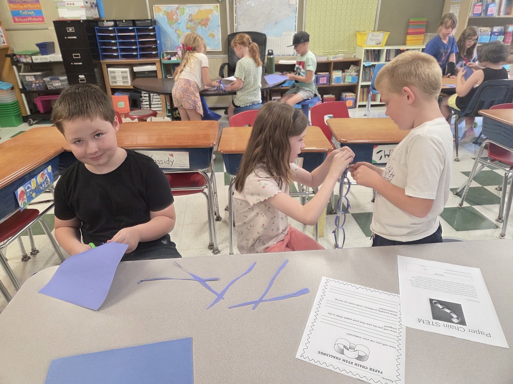 3rd grade builds the longest paper chain in 15 minutes!