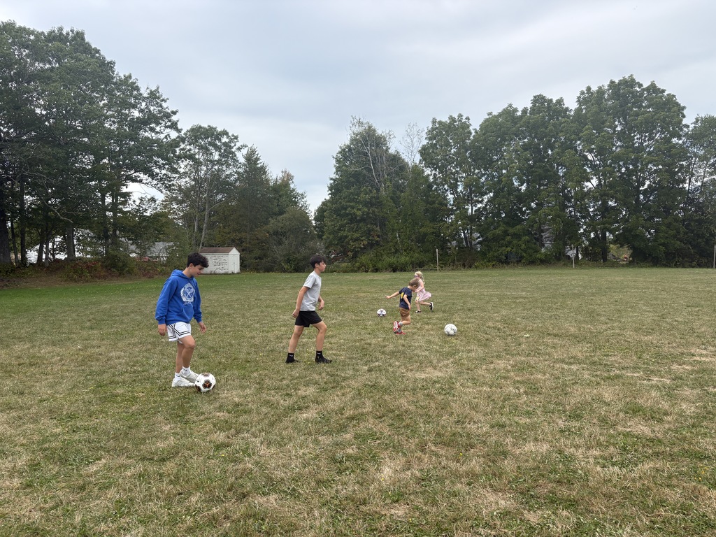  Kindergarten and 7/8th graders have been having a ball with Soccer in PE!