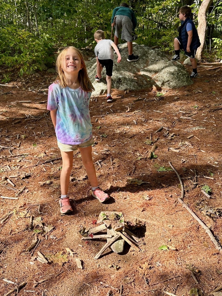 Mrs. Flewelling’s class loves playing in the woods!