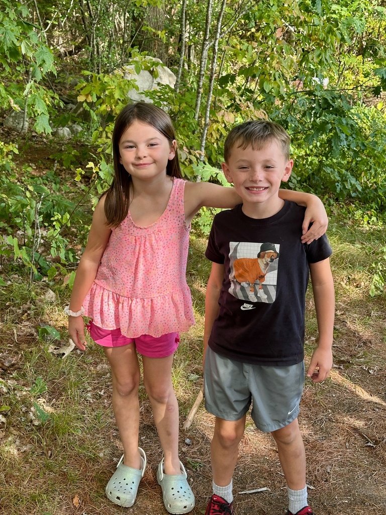 Mrs. Flewelling’s class loves playing in the woods!