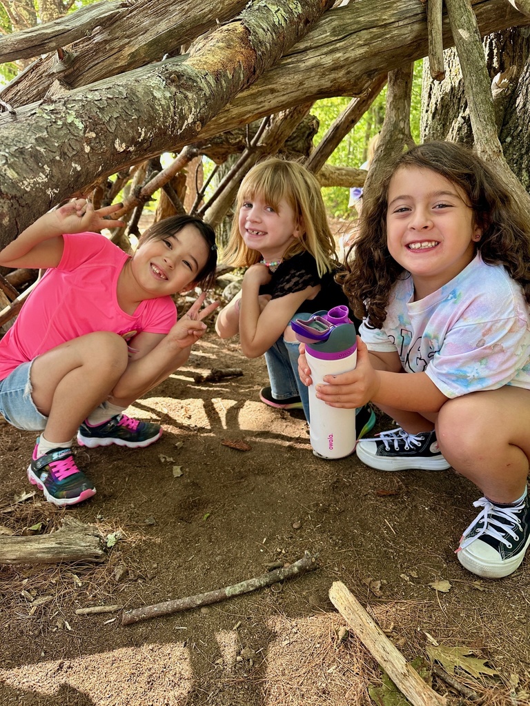 Mrs. Flewelling’s class loves playing in the woods!