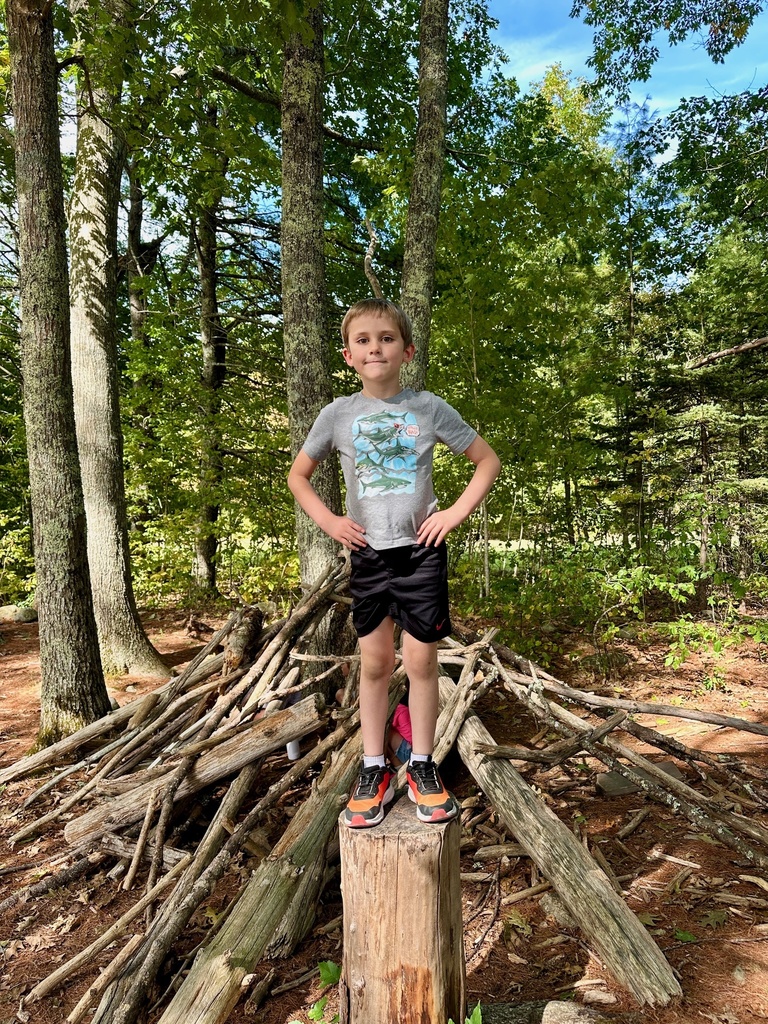 Mrs. Flewelling’s class loves playing in the woods!