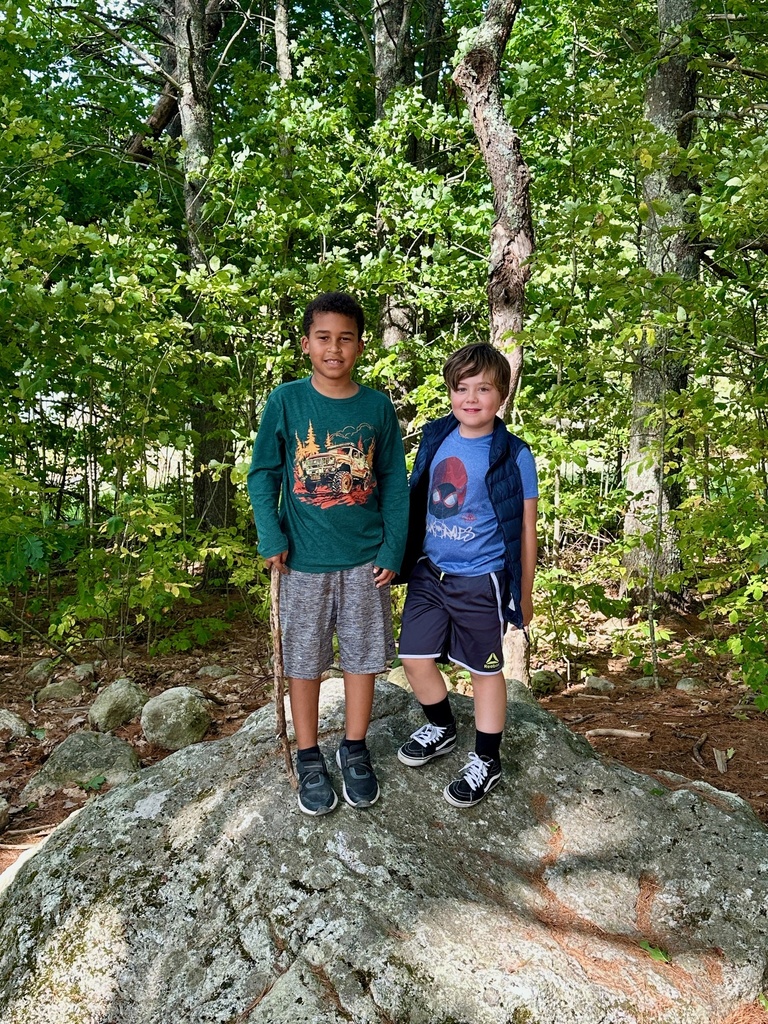 Mrs. Flewelling’s class loves playing in the woods!