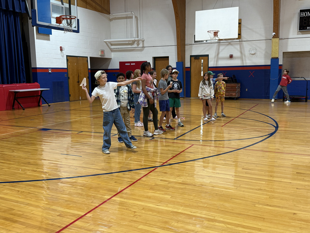 Mrs. Girard's homeroom participates in Figure it Out Friday during homeroom time. This round was a challenge to create the farthest flying plane.