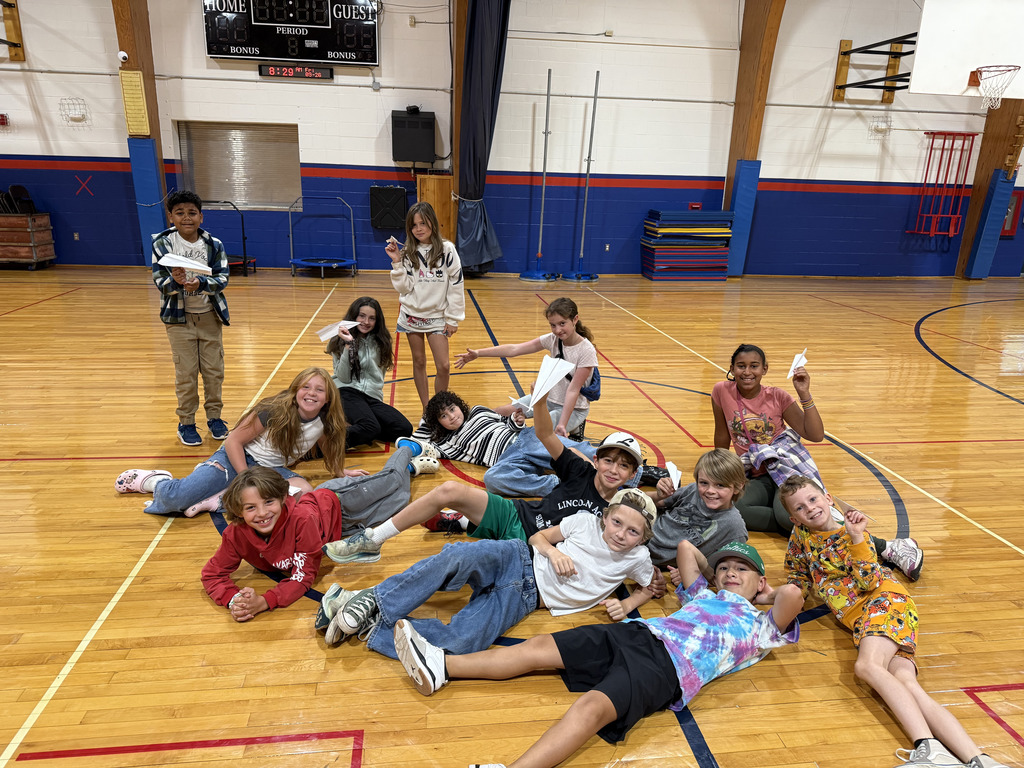 Mrs. Girard's homeroom participates in Figure it Out Friday during homeroom time. This round was a challenge to create the farthest flying plane.