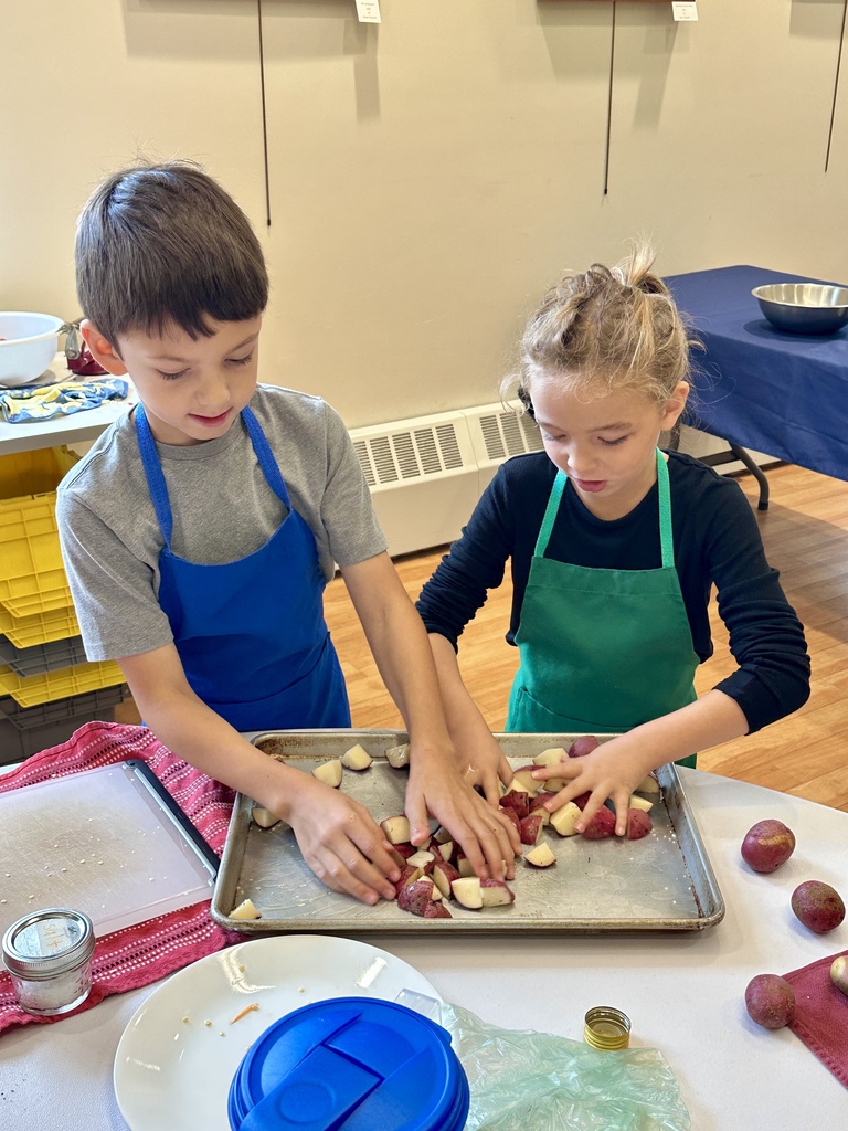 Mrs. Flewelling’s 2nd graders enjoying FARMS Kitchen at the Y!