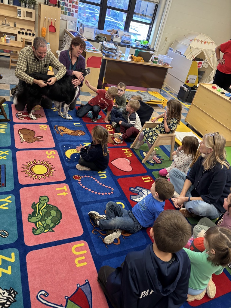 Mr. Mark and Ms. Liz shared their dog, Loki, with the pre-k class while we talked about pets and how to care for them