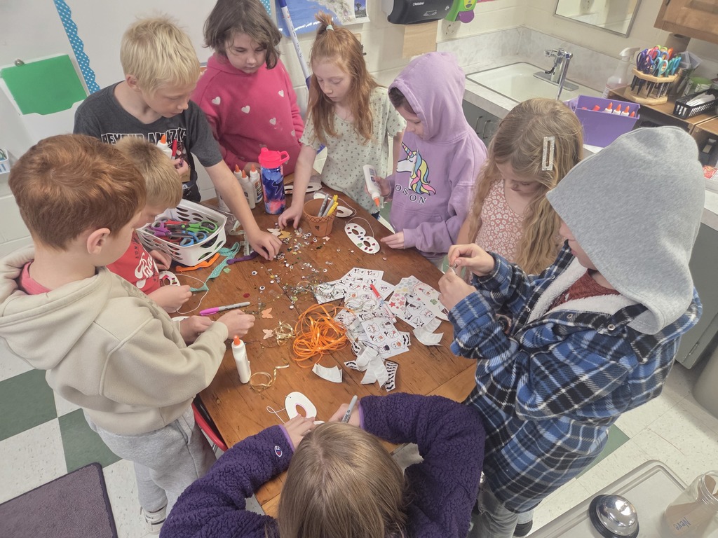 Third graders enjoyed making masks for the jog-a-thon then running wild through the obstacle course.