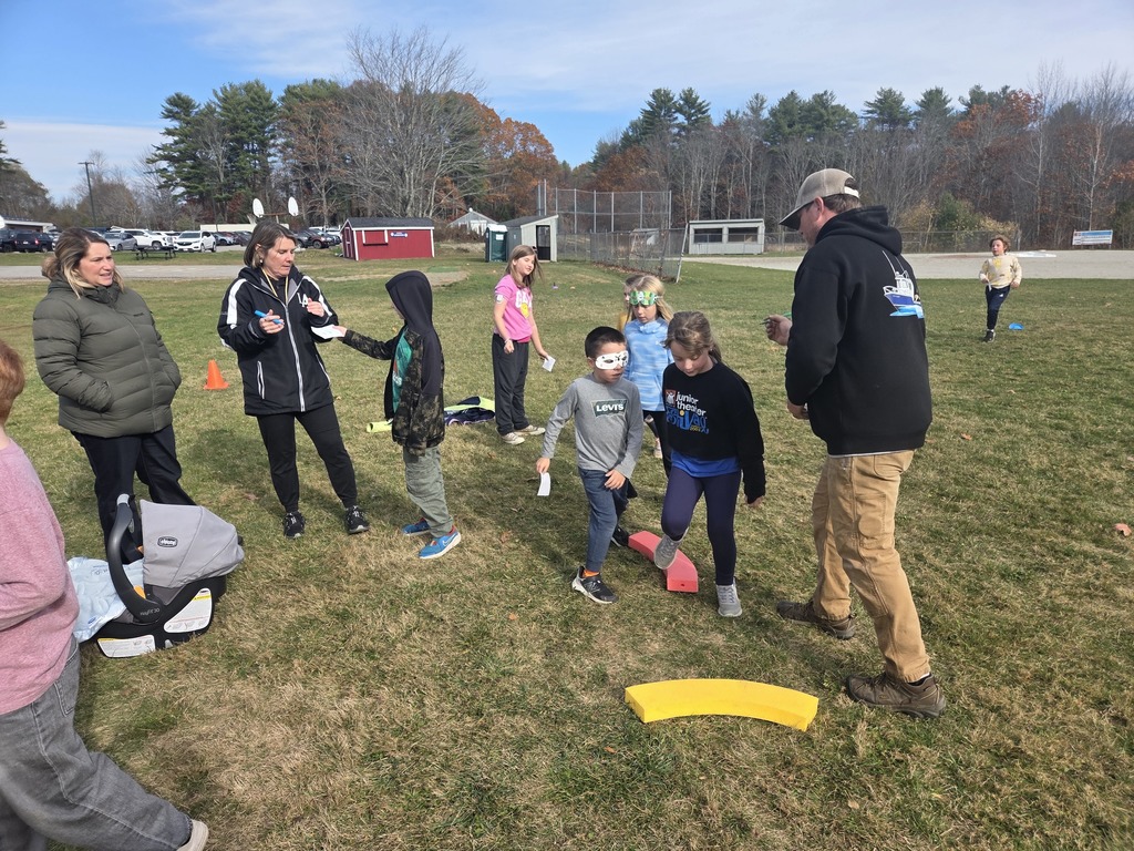 Third graders enjoyed making masks for the jog-a-thon then running wild through the obstacle course.