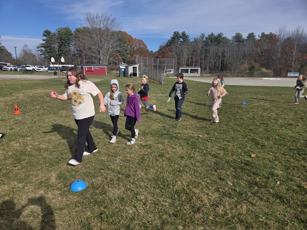 Third graders enjoyed making masks for the jog-a-thon then running wild through the obstacle course.