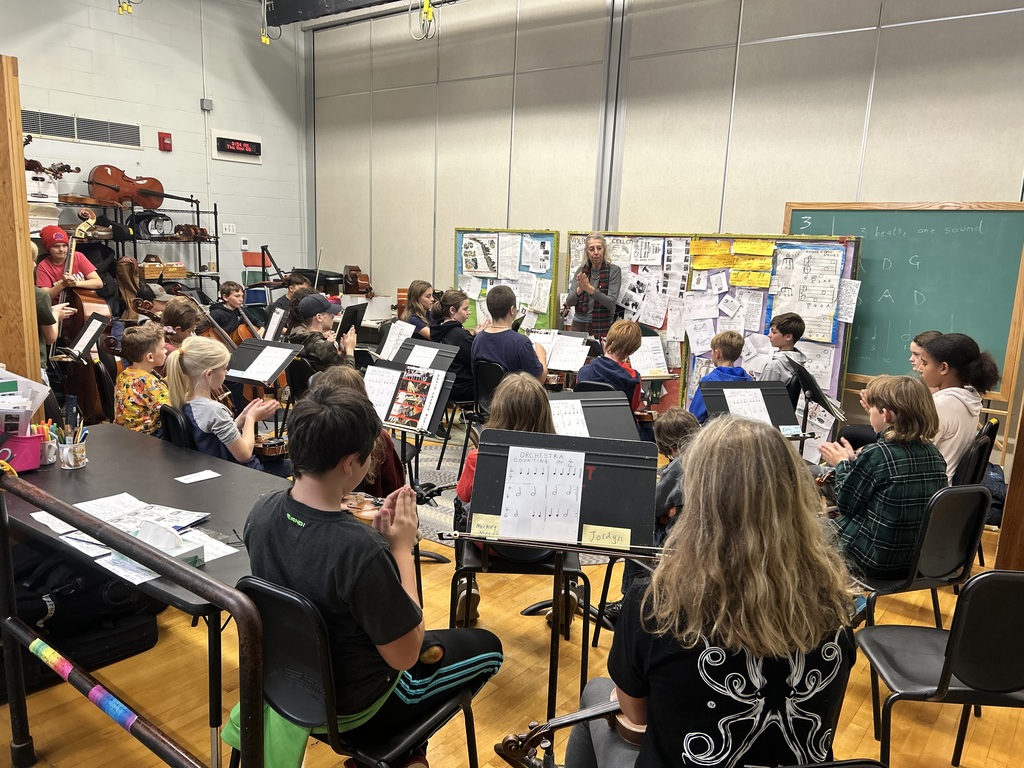 GSB 5/6 students in strings class clapping rhythms