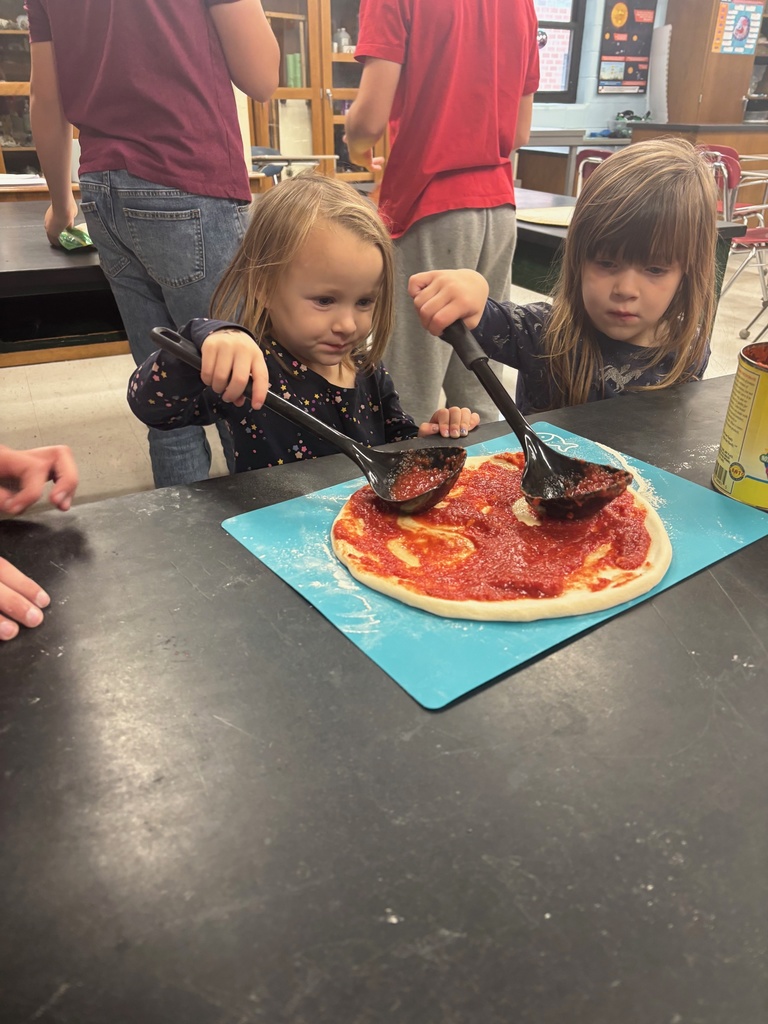 Pre-k got to try out their pizza making skills with the help of some 7th and 8th graders
