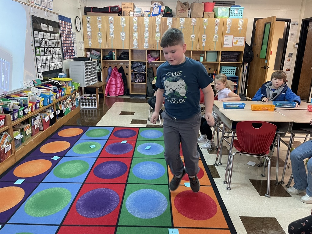 Mrs. Ettinger's class learned about telling time by jumping around the clock and making a human clock!