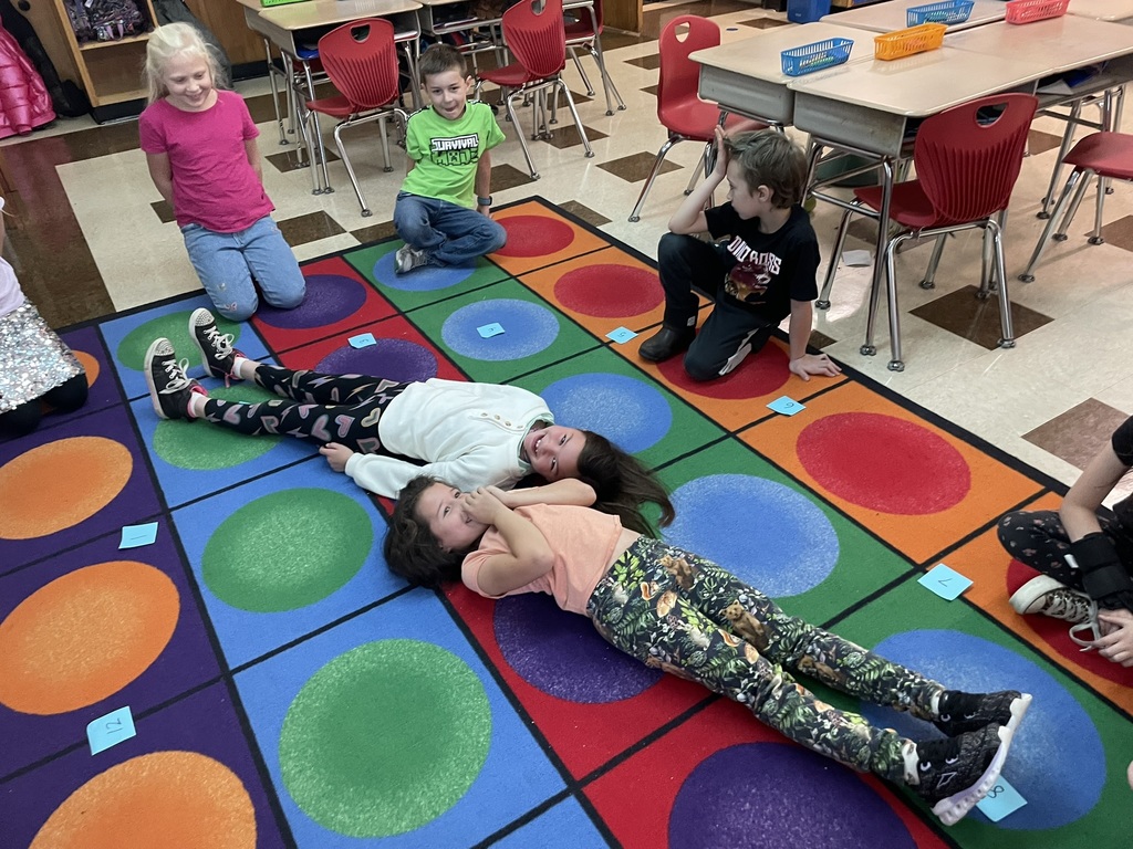 Mrs. Ettinger's class learned about telling time by jumping around the clock and making a human clock!
