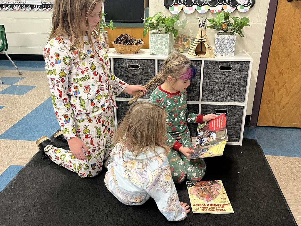 Mr Coleman's Class enjoying Pajama Day with their Reading Buddies in Mrs. Ball's Kindergarten class.