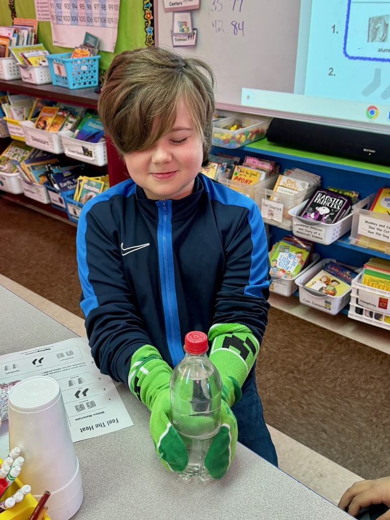 Mrs. Flewelling’s class testing out materials for the property of insulating!