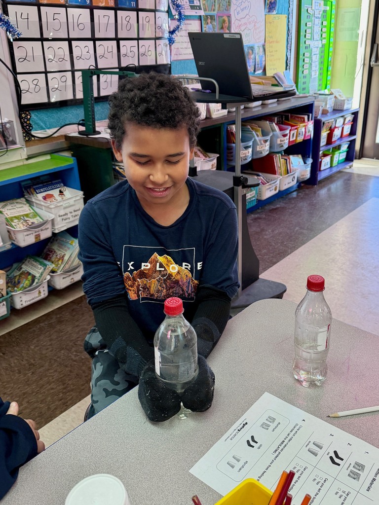 Mrs. Flewelling’s class testing out materials for the property of insulating!