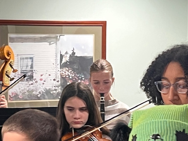 7/8 Music Students caroling at Coves Edge