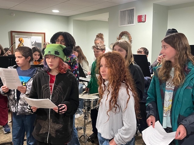 7/8 Music Students caroling at Coves Edge