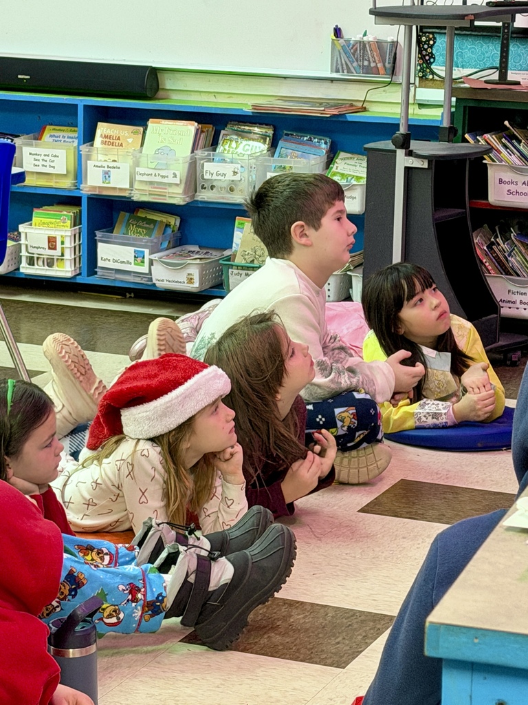 Mrs. Dakin reading to 2nd graders on the last day of school before break.