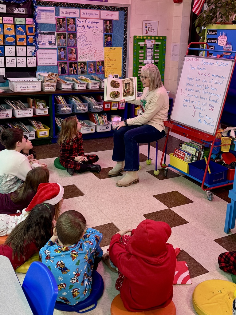 Mrs. Dakin reading to 2nd graders on the last day of school before break.