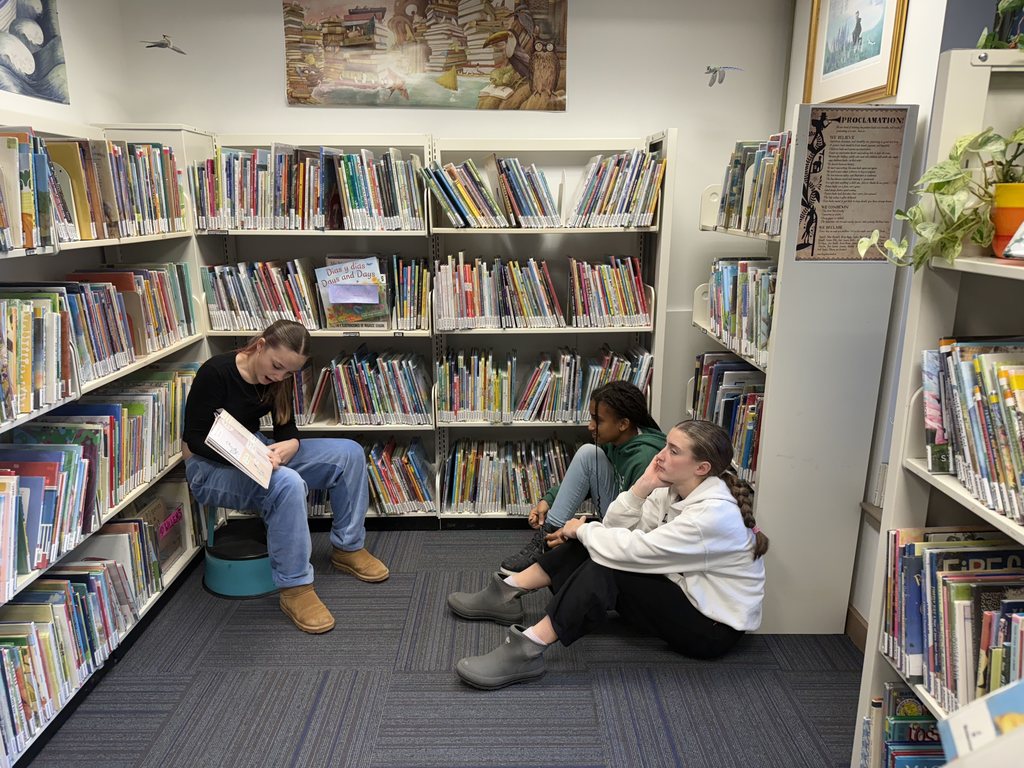Mrs. Girard's 6th graders enjoy some quiet reading time while visiting Skidompha. 