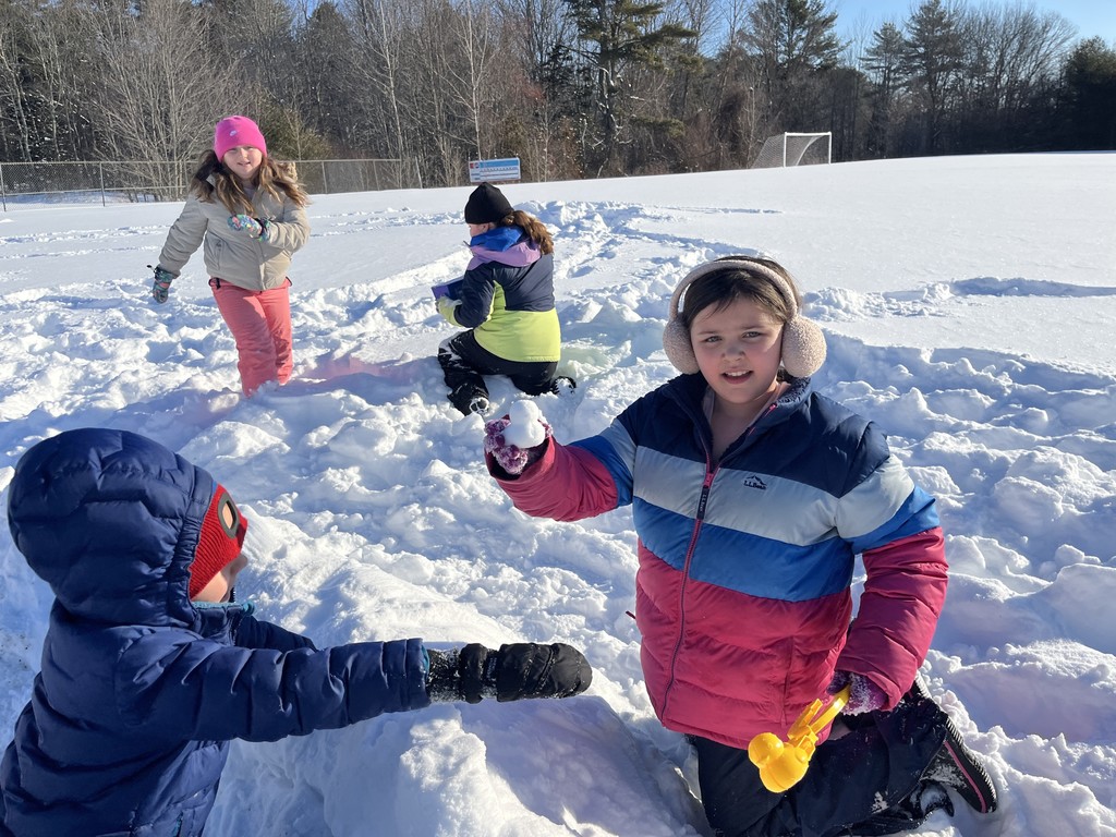 Students working on the igloo village and tunnel obstacle course during art class