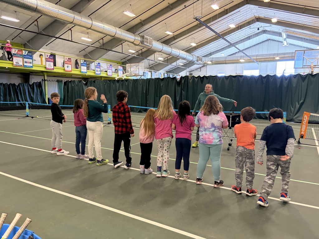 Mrs. Michaud’s 2nd grade class enjoying tennis at the CLC YMCA!